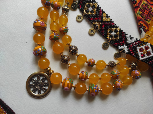 Decorative metal: metal elements of traditional ukrainian neck jewelry